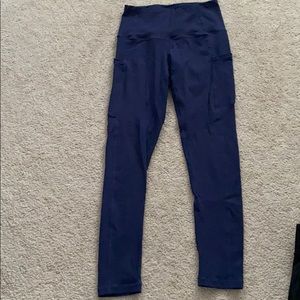 Navy blue workout leggings with side pockets